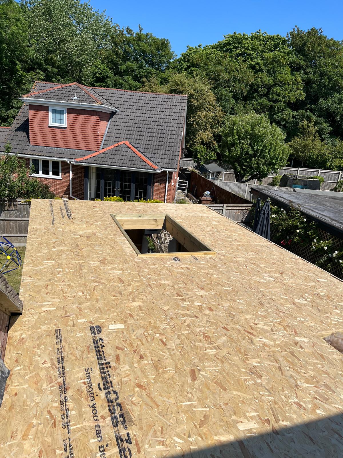 Roof deck with skylight opening