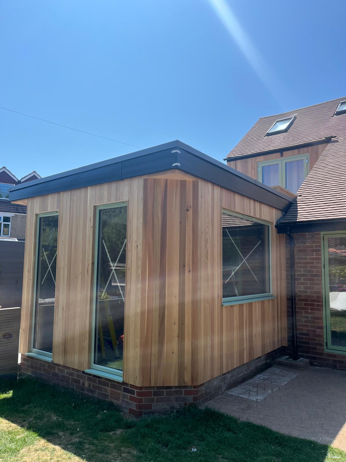 Thermally-modified cedar cladding